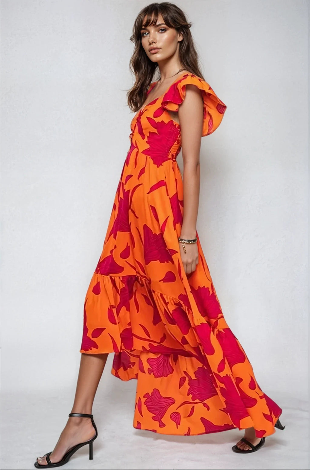 Maxivestido asimétrico con estampado floral vibrante