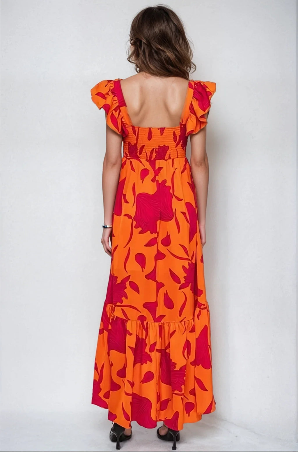 Maxivestido asimétrico con estampado floral vibrante