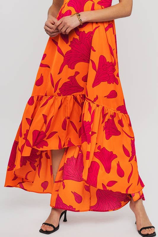 Maxivestido asimétrico con estampado floral vibrante
