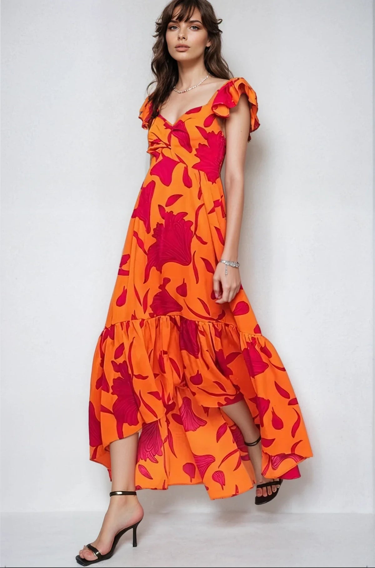 Maxivestido asimétrico con estampado floral vibrante